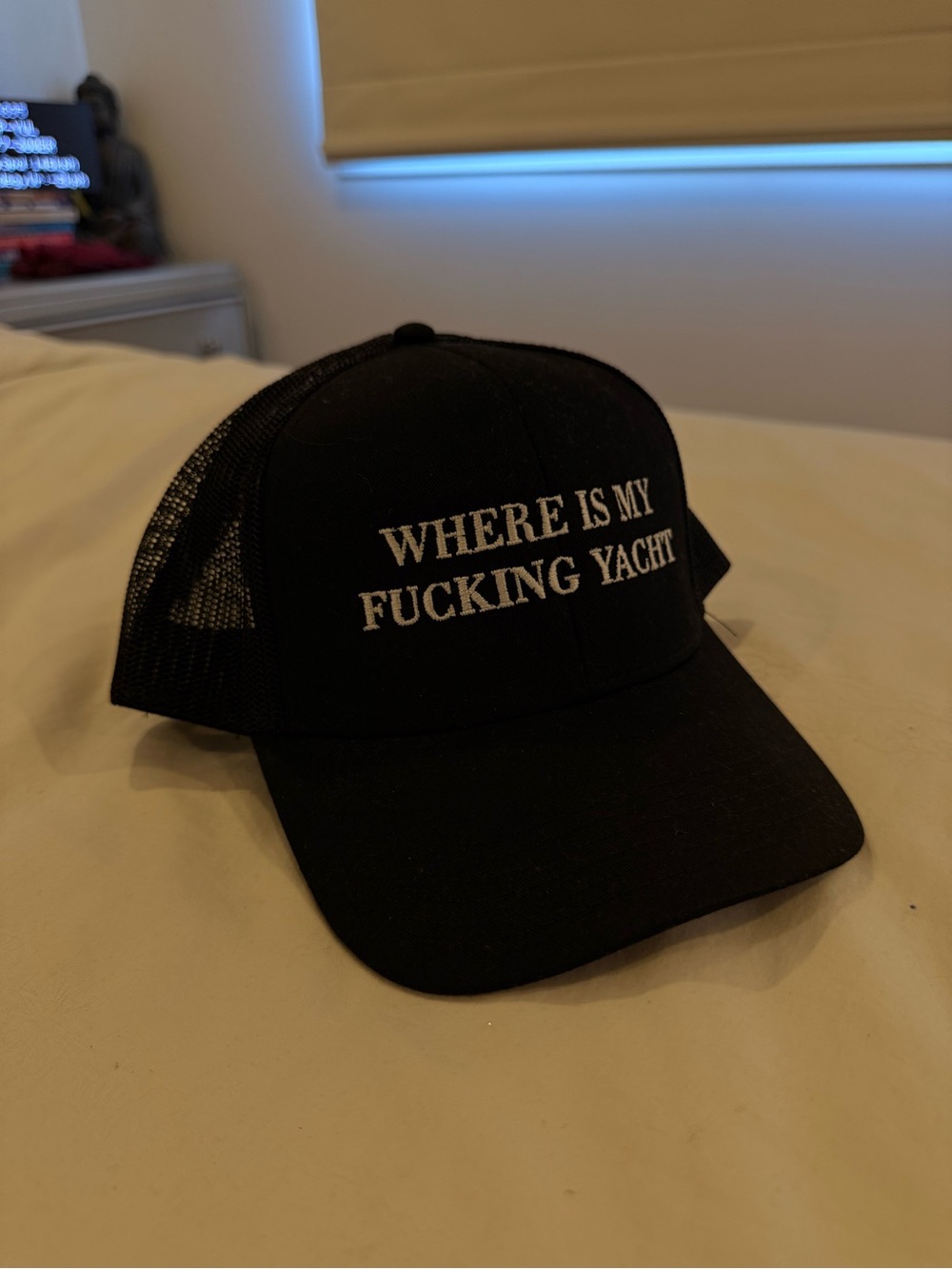 Black Trucker Cap with White Embroidered Slogan